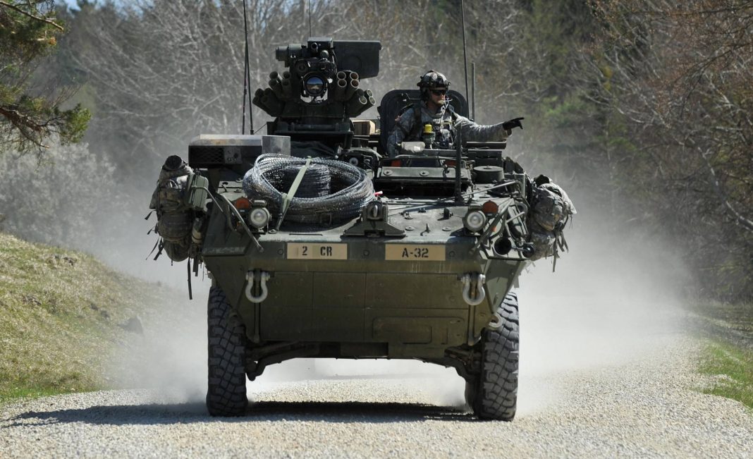 A Stryker vehicle of Apache Company, 1st Squadron, performs movement to contact training at the Hohenfels Training Area while conducting company external evaluations April 27, 2012.